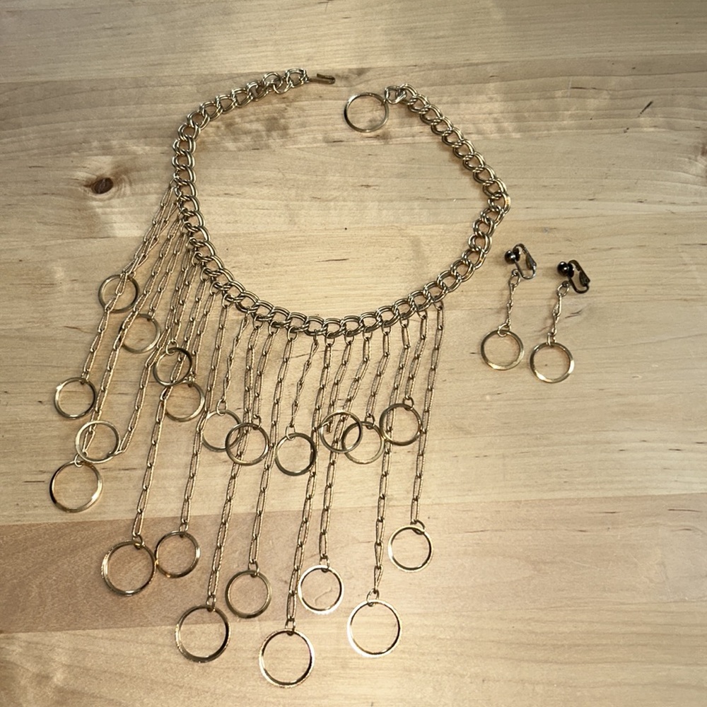 Vintage 1960s gold tone disco glam necklace and earring set.